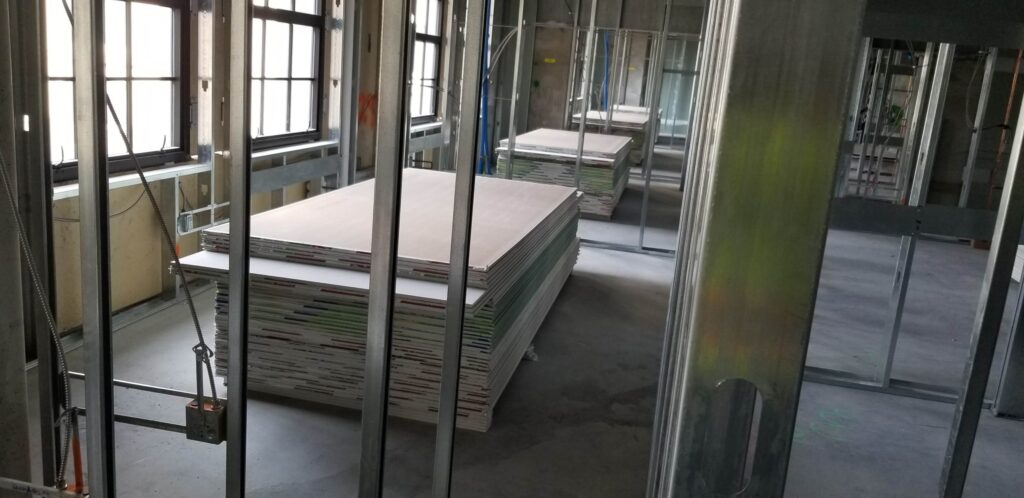 Drywall stacked to save time at the Escondido Village jobsite